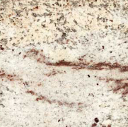 Close-up of a light speckled stone surface with a thin reddish-brown vein.