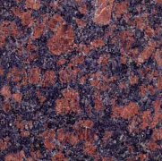 Mottled dark purple and reddish-brown granite texture