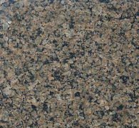 Close-up of speckled brown, gray, and black granite surface