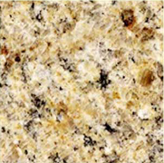 Close-up of beige and brown speckled granite countertop texture