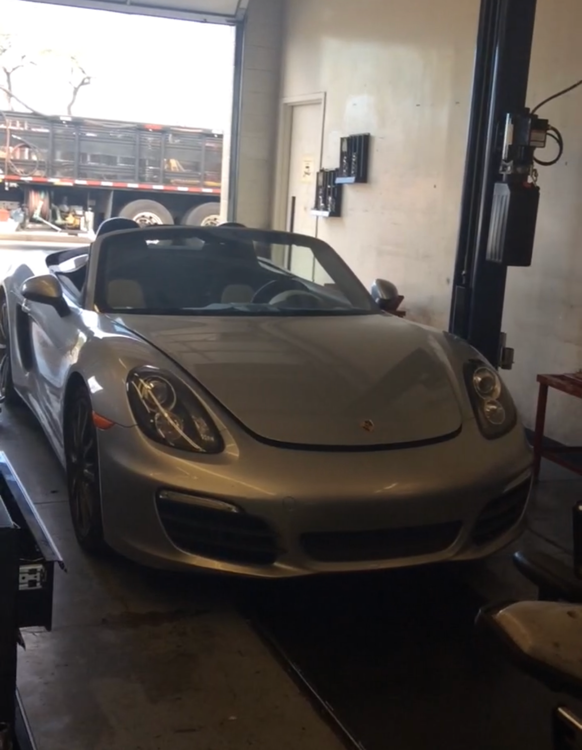 Highline vehicle in repair at shop | New Dimensions Automotive