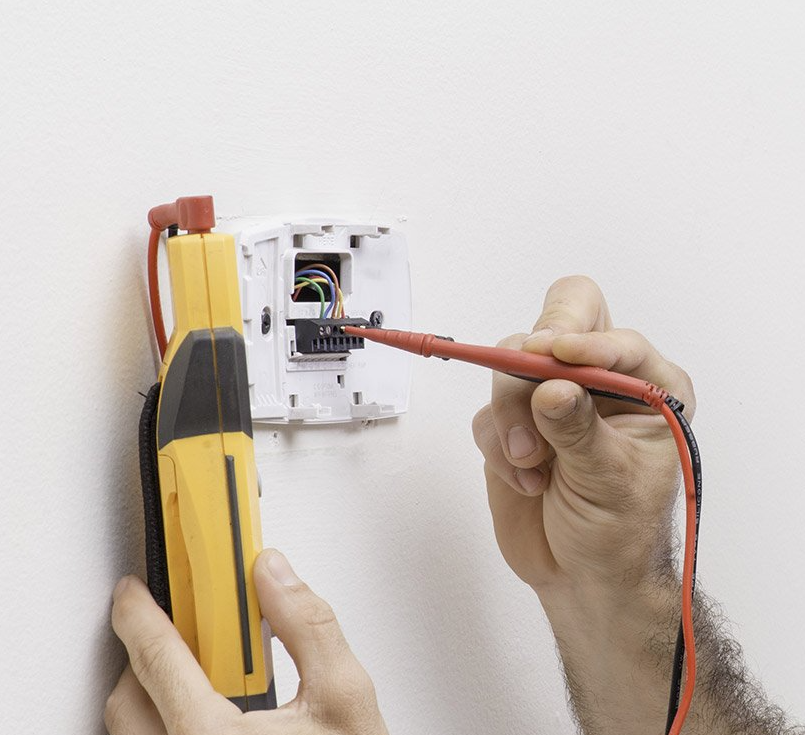 TTM Electrician carrying out an EICR electrical safety inspection in an Oxfordshire property