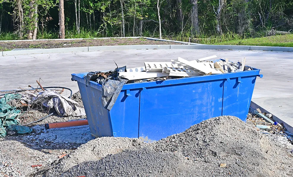 Blue Skip Bin on a Construction Site — Select Site Solutions in Kiama, NSW
