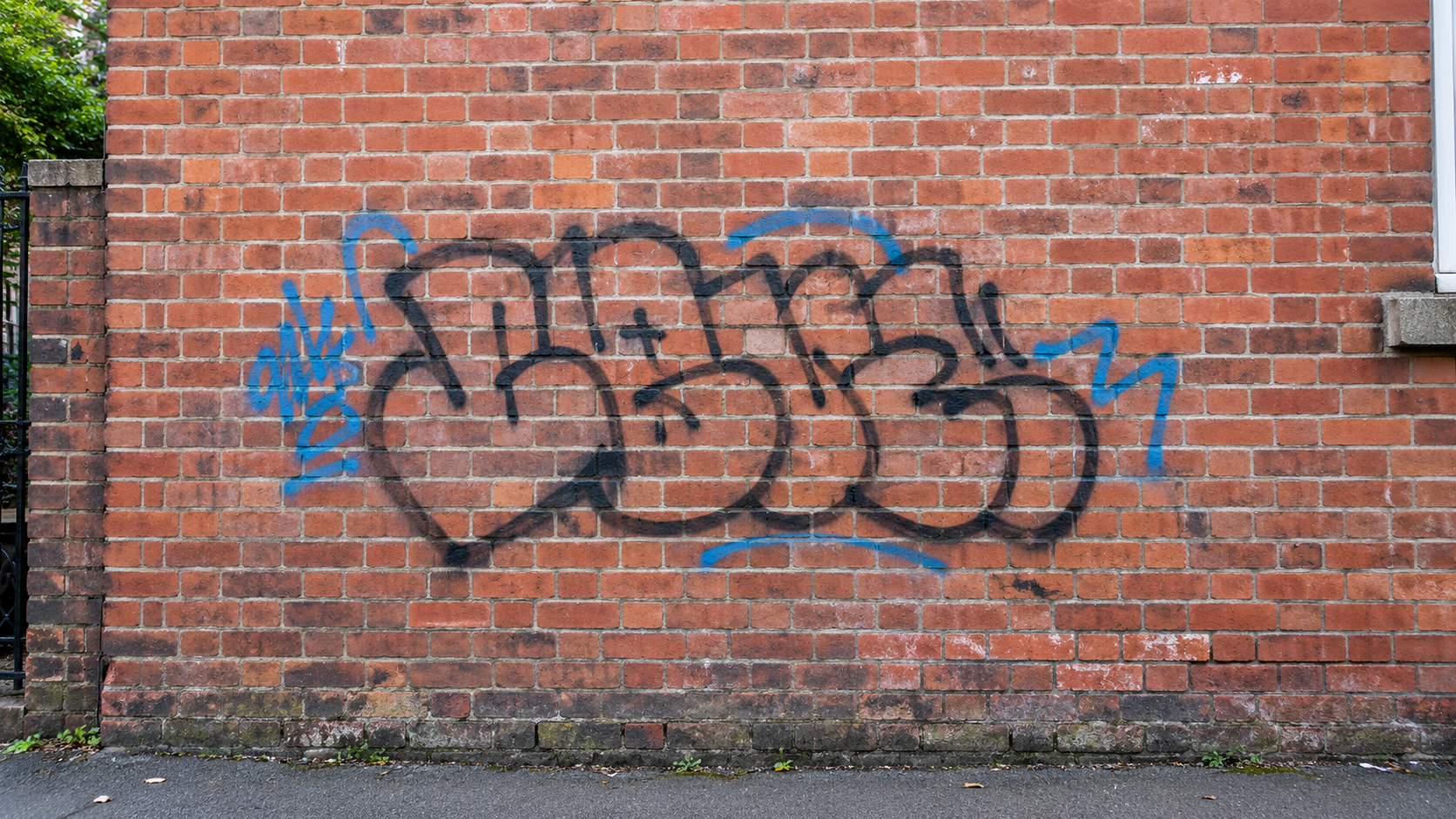graffiti on a brick wall