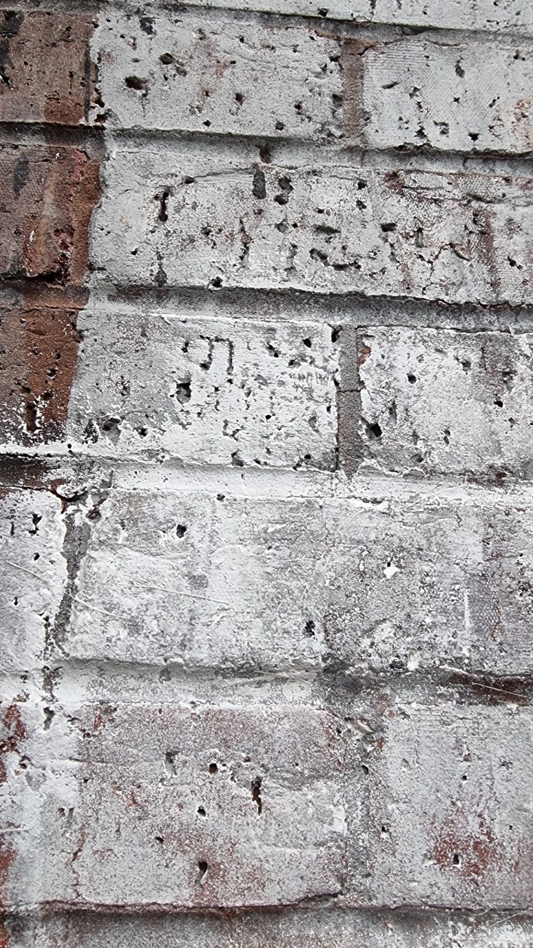 paint bonded into brick surface