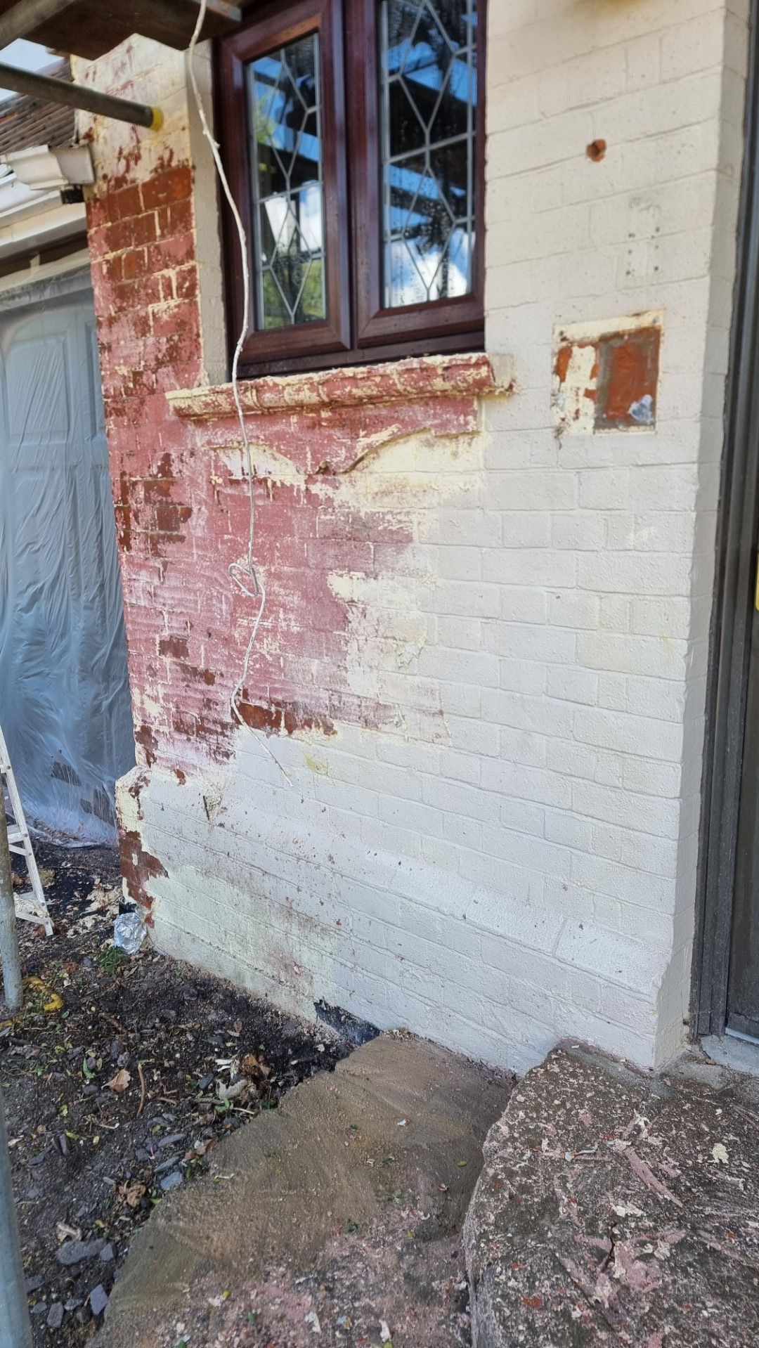 multiple coats of paint on brickwork
