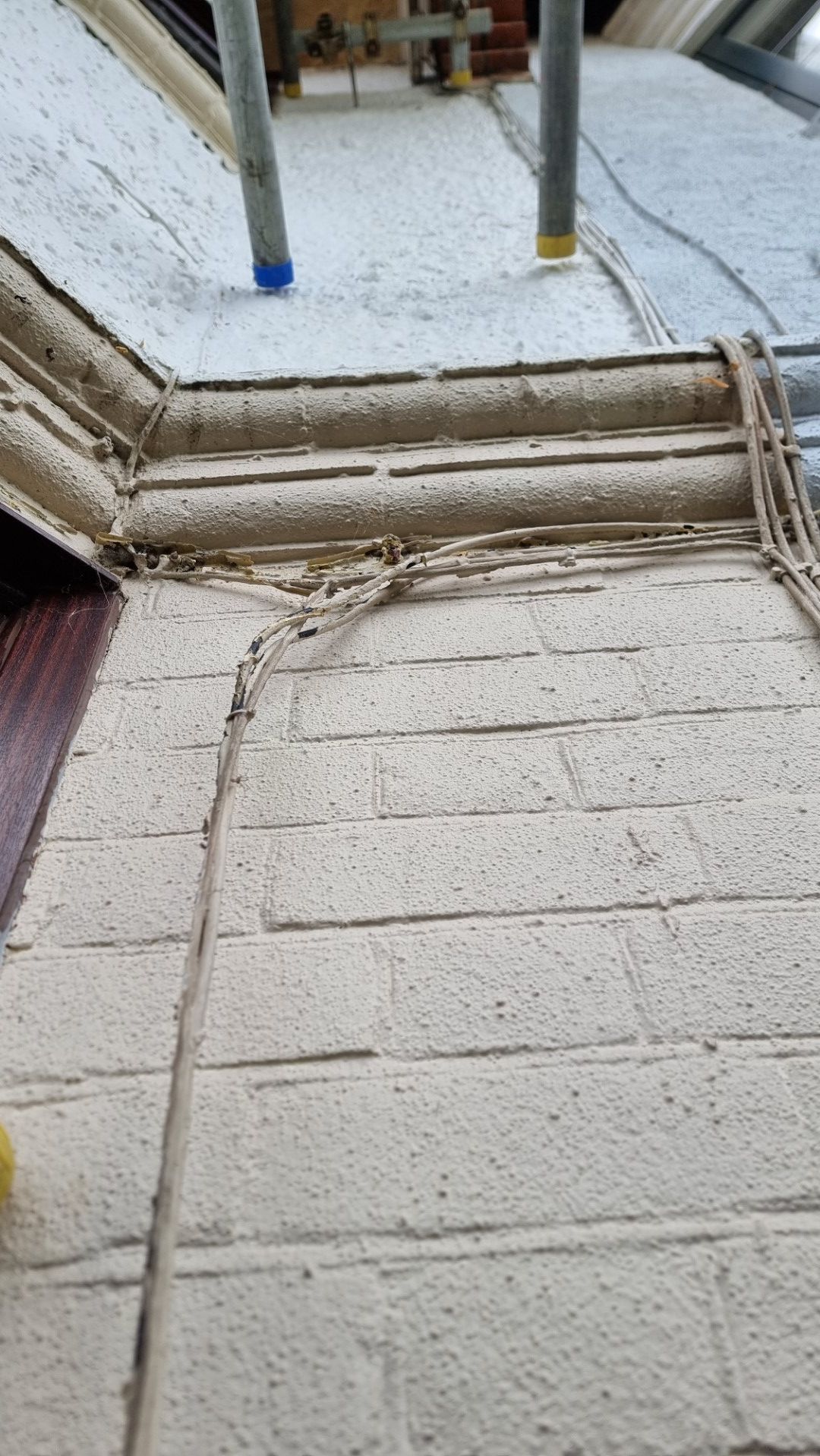 textured thick paint on brick