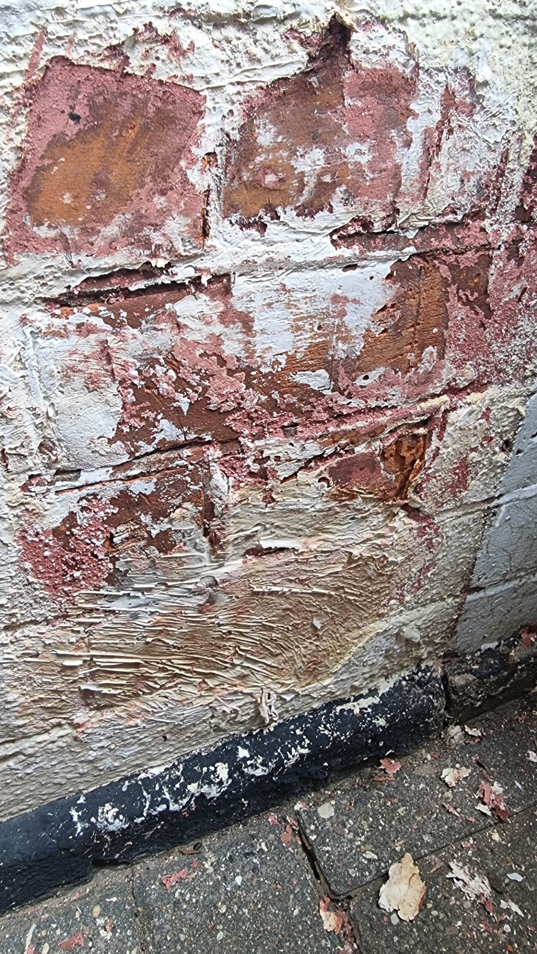paint softening chemicals on brickwork