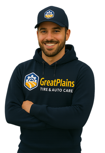 Man wearing GreatPlains Fire & Auto Care hat and hoodie, smiling with arms crossed.