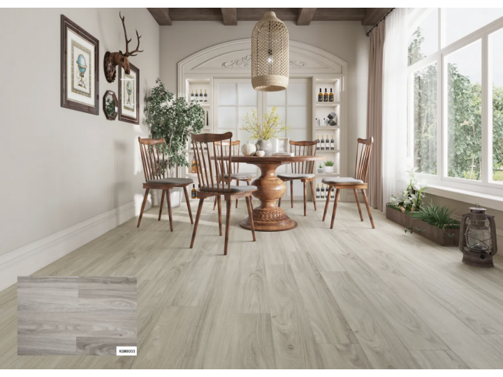 Dining room with wood table, chairs, hardwood floor, window, and decorative items.