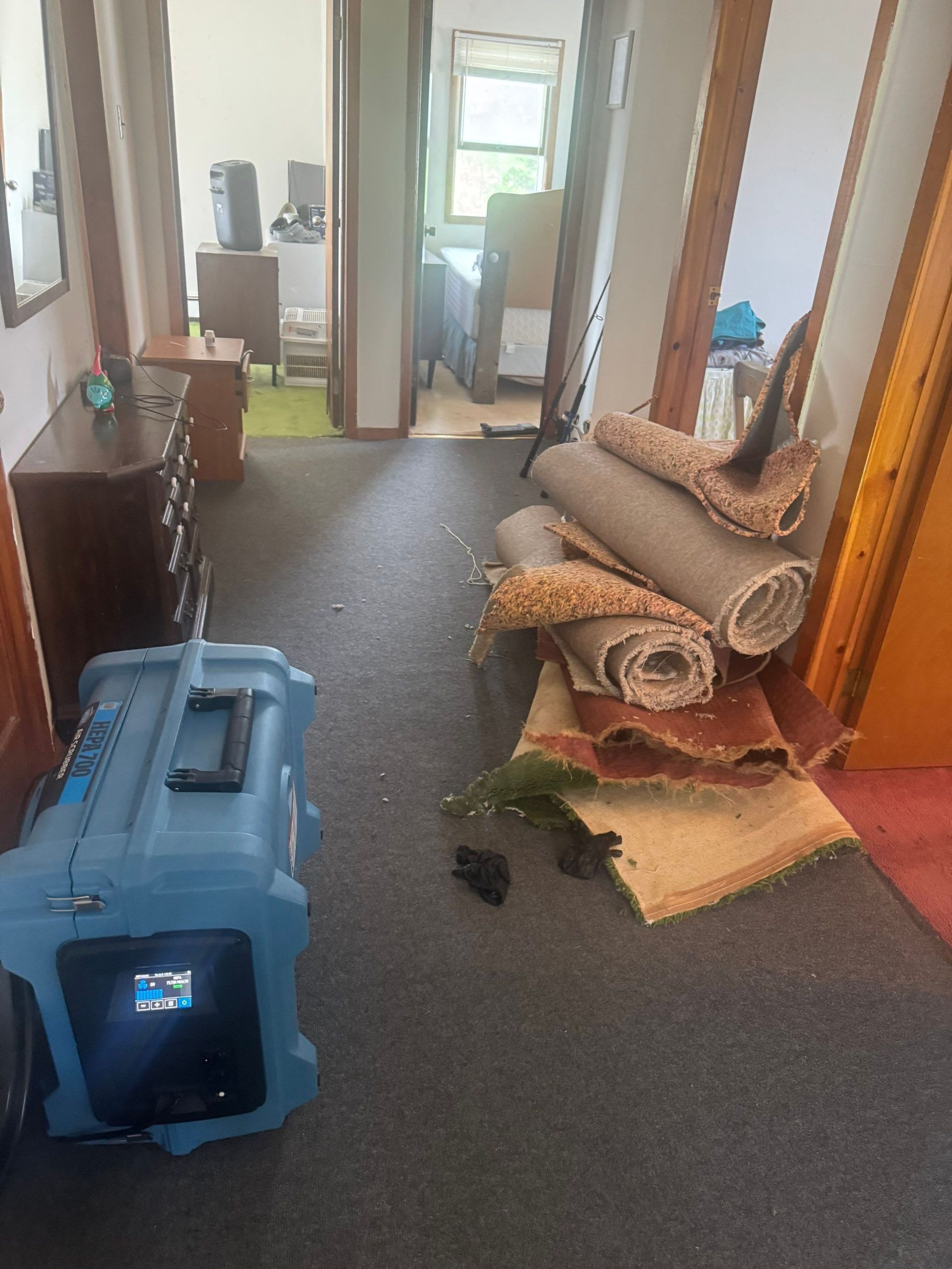 Water damage restoration dehumidifier inside home
