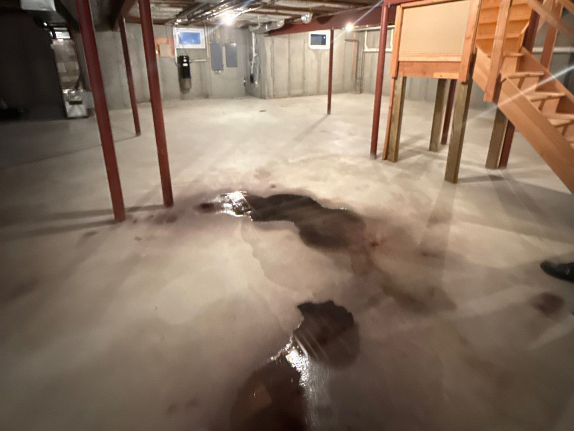 moisture in a basement after flooding from the bathroom