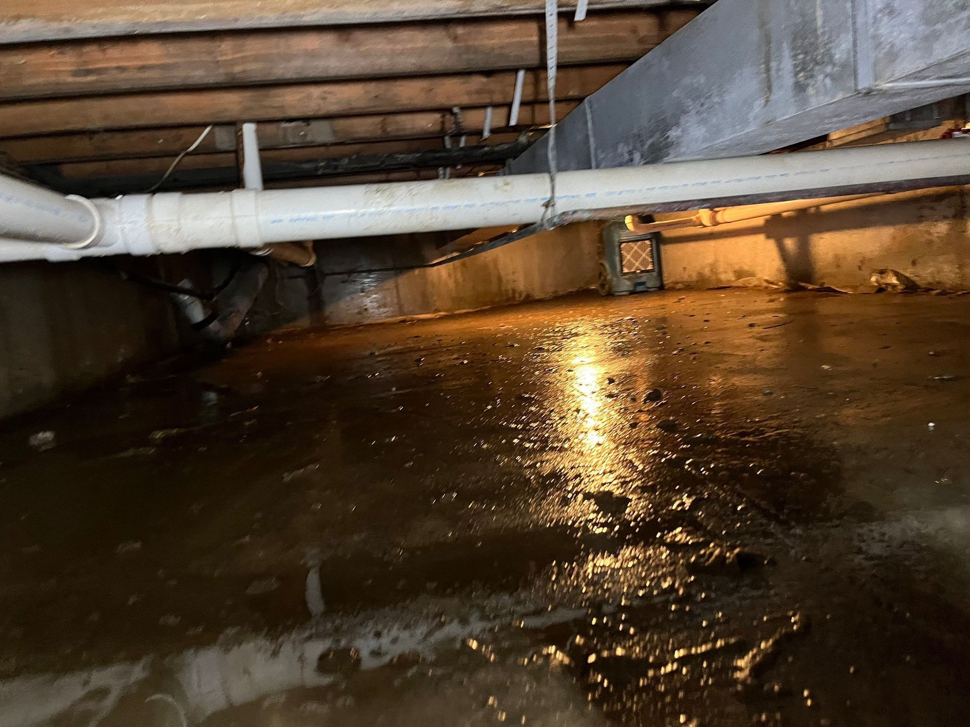 Flooded crawlspace after flood at home in Westhampton Beach NY