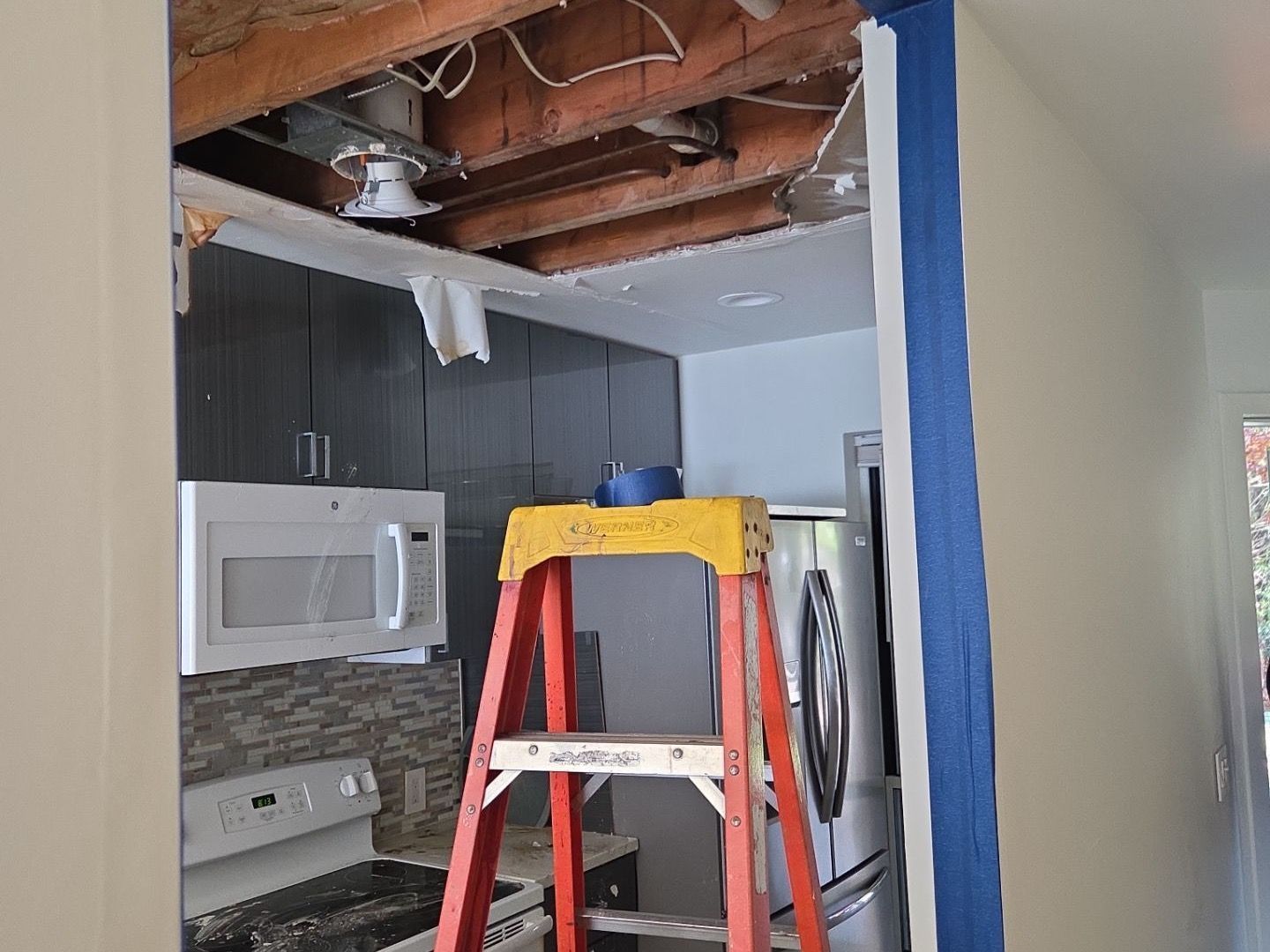 Ceiling removed at home after flood at home in Westhampton Beach NY
