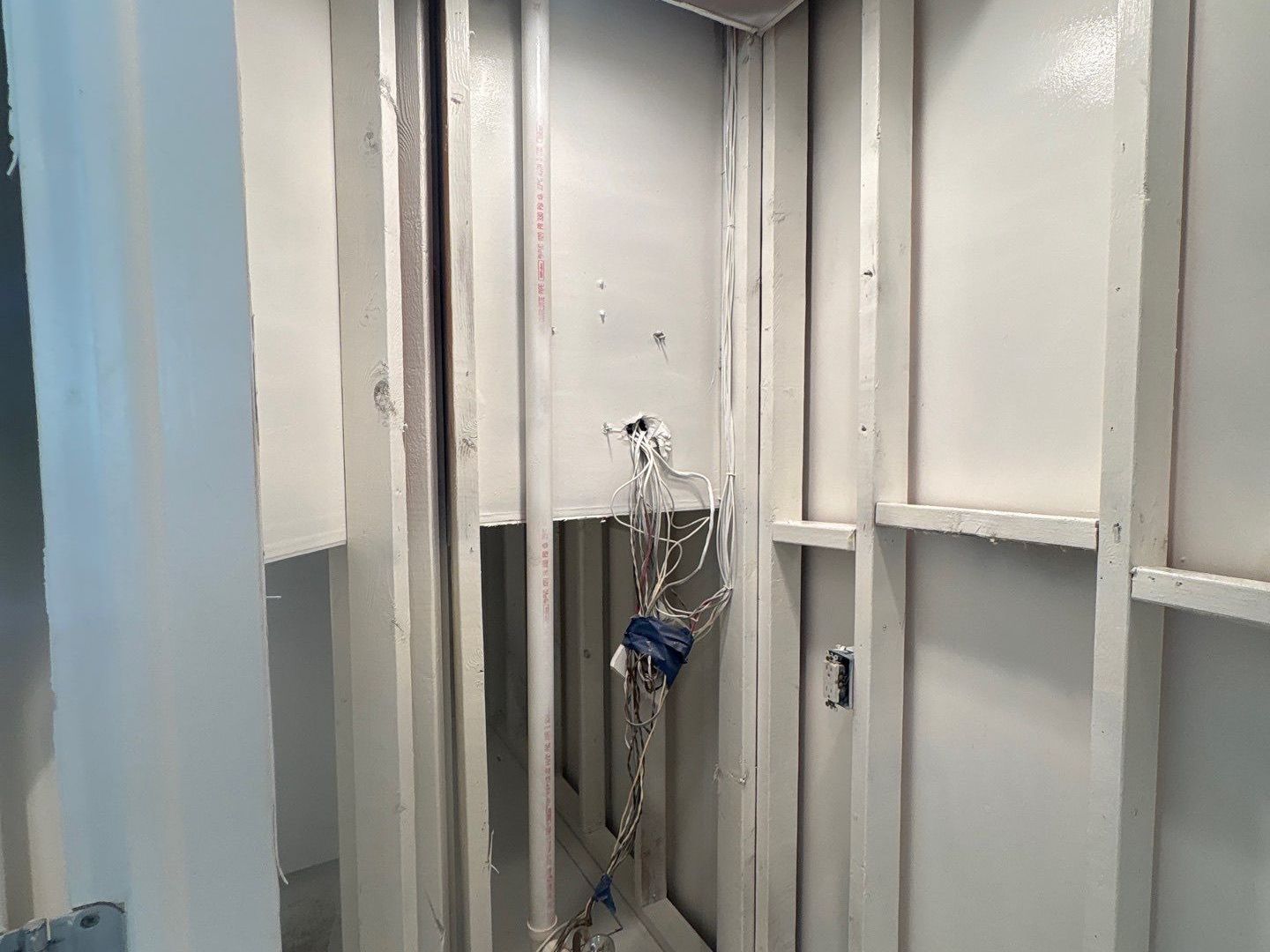Mold encapsulation completed section with secured wiring after water damage restoration was competed at home in Westhampton Beach