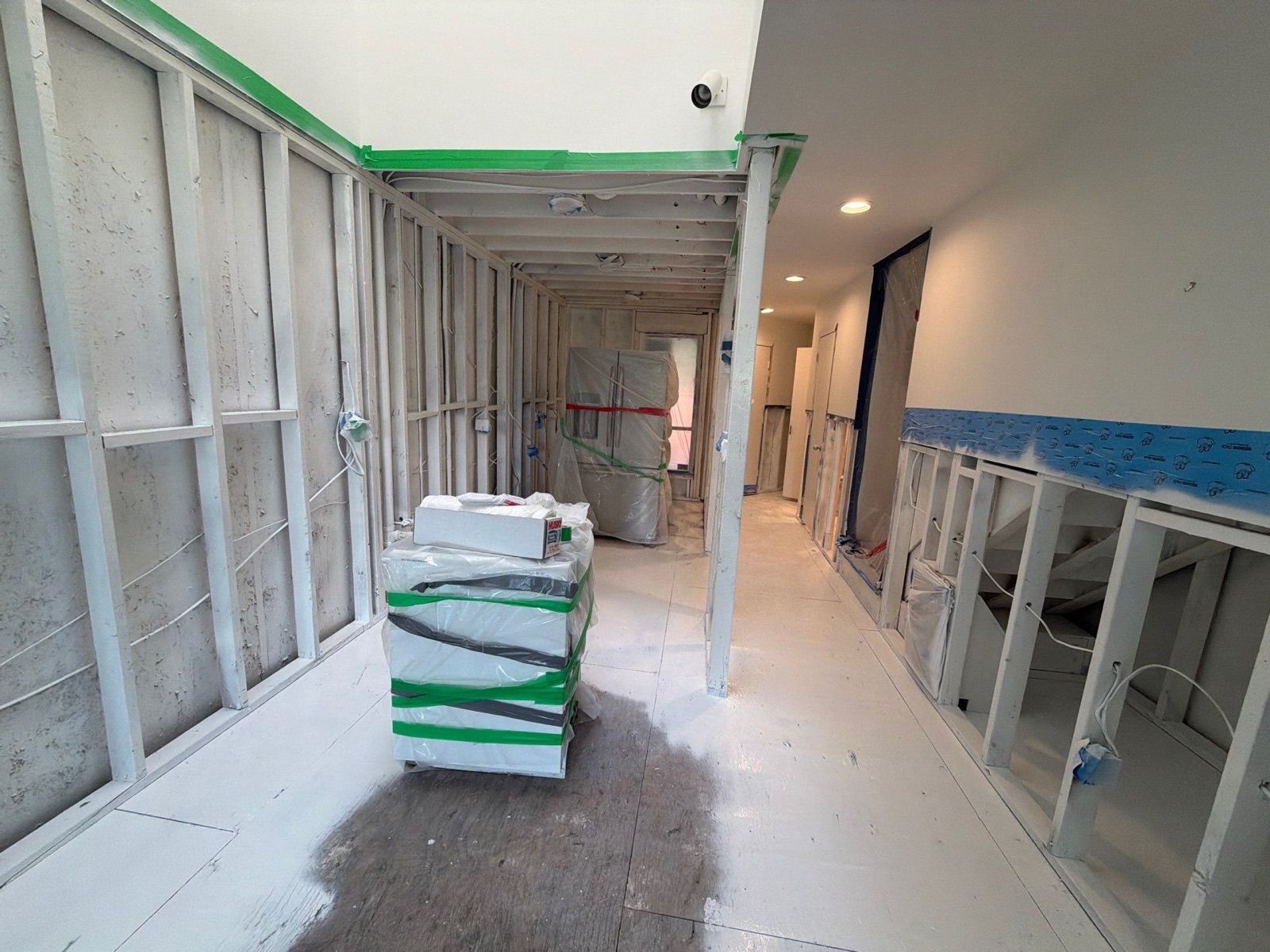 Mold encapsulation in progress after water damage restoration was competed at home in Westhampton Beach