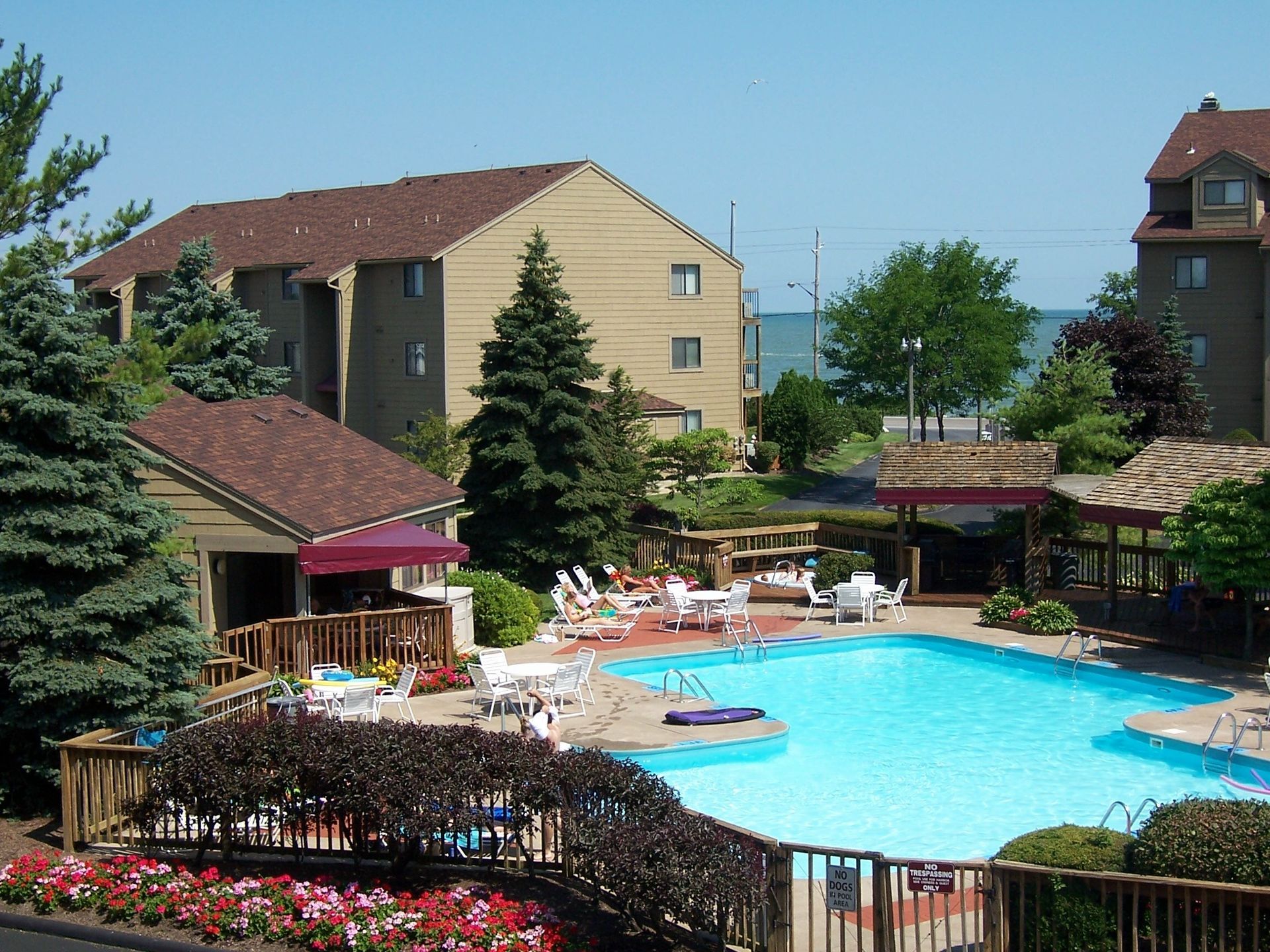 A large swimming pool in front of a building