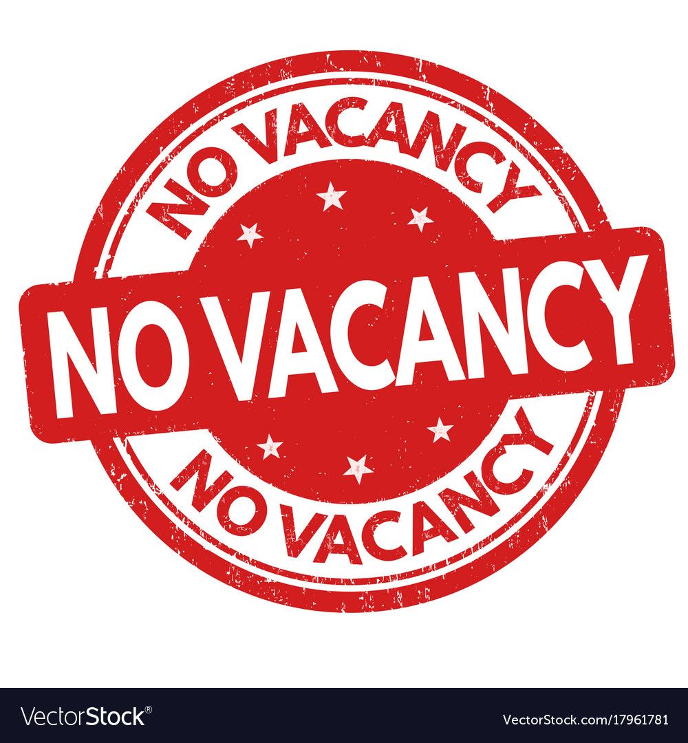 A red no vacancy stamp on a white background