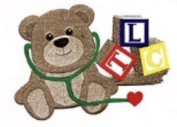 Teddy bear with stethoscope and toy blocks that spell LTC.