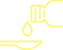 Medicine being poured from a bottle into a spoon.