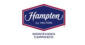Logotipo de Hampton by Hilton con el texto Montevideo Carrasco sobre fondo blanco.