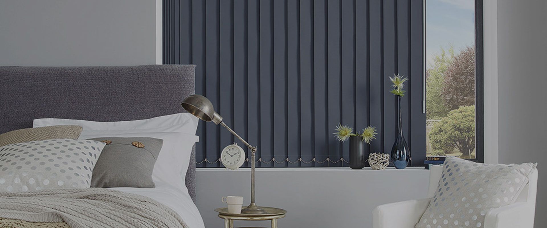 Bedroom Interior With Blue Vertical Blinds — Abundance Blinds In Charmhaven, NSW