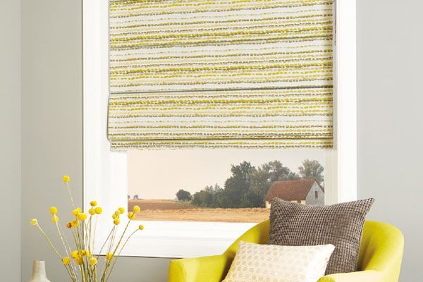 Yellow Patterned Roman Shade in a Window — Abundance Blinds In Charmhaven, NSW