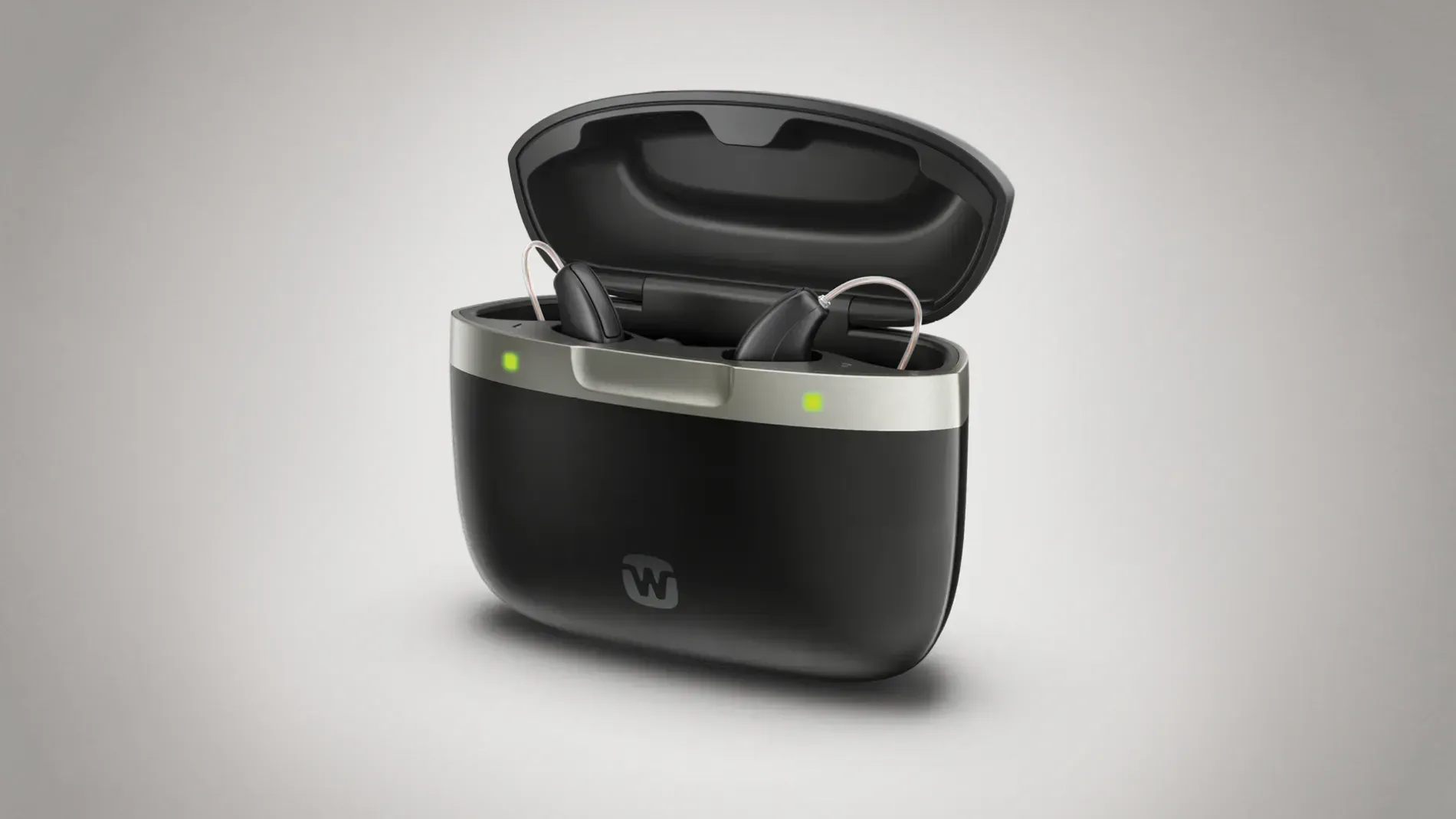 Black wireless earbuds in an open charging case on a light gray background