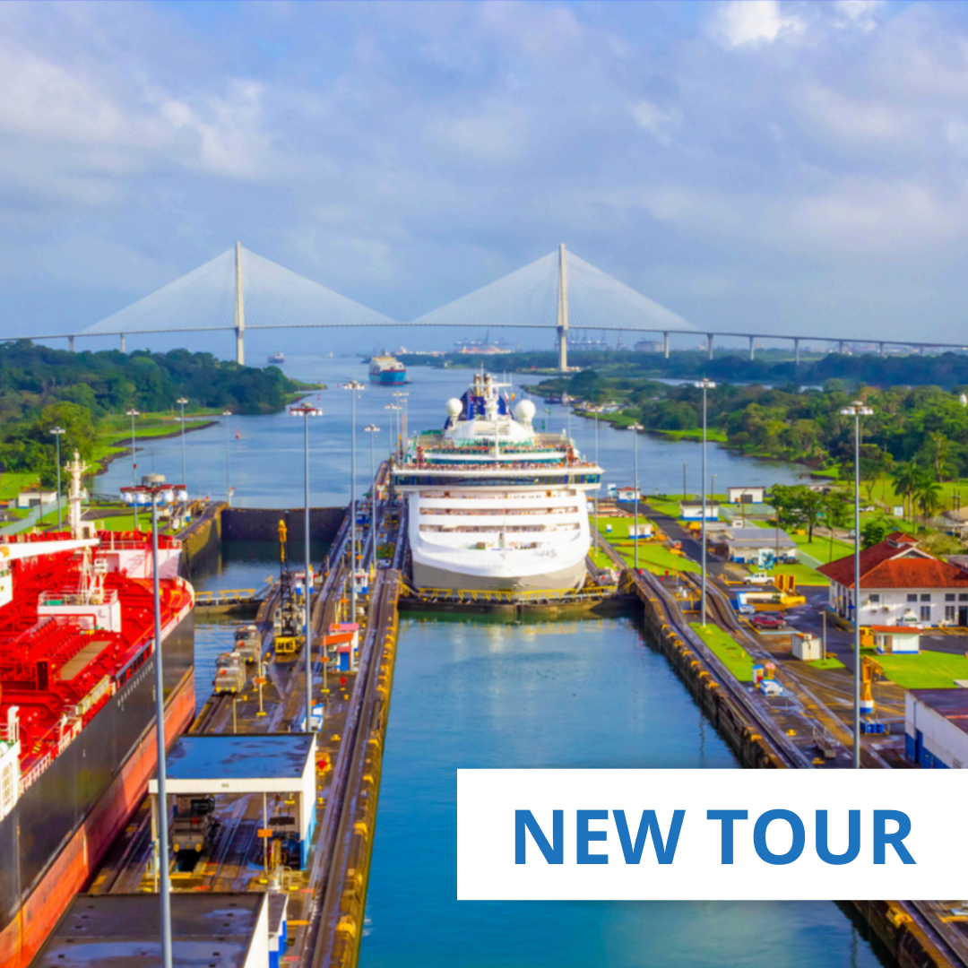 Crown Princess cruise ship transiting the Panama Canal locks surrounded by tropical rainforest