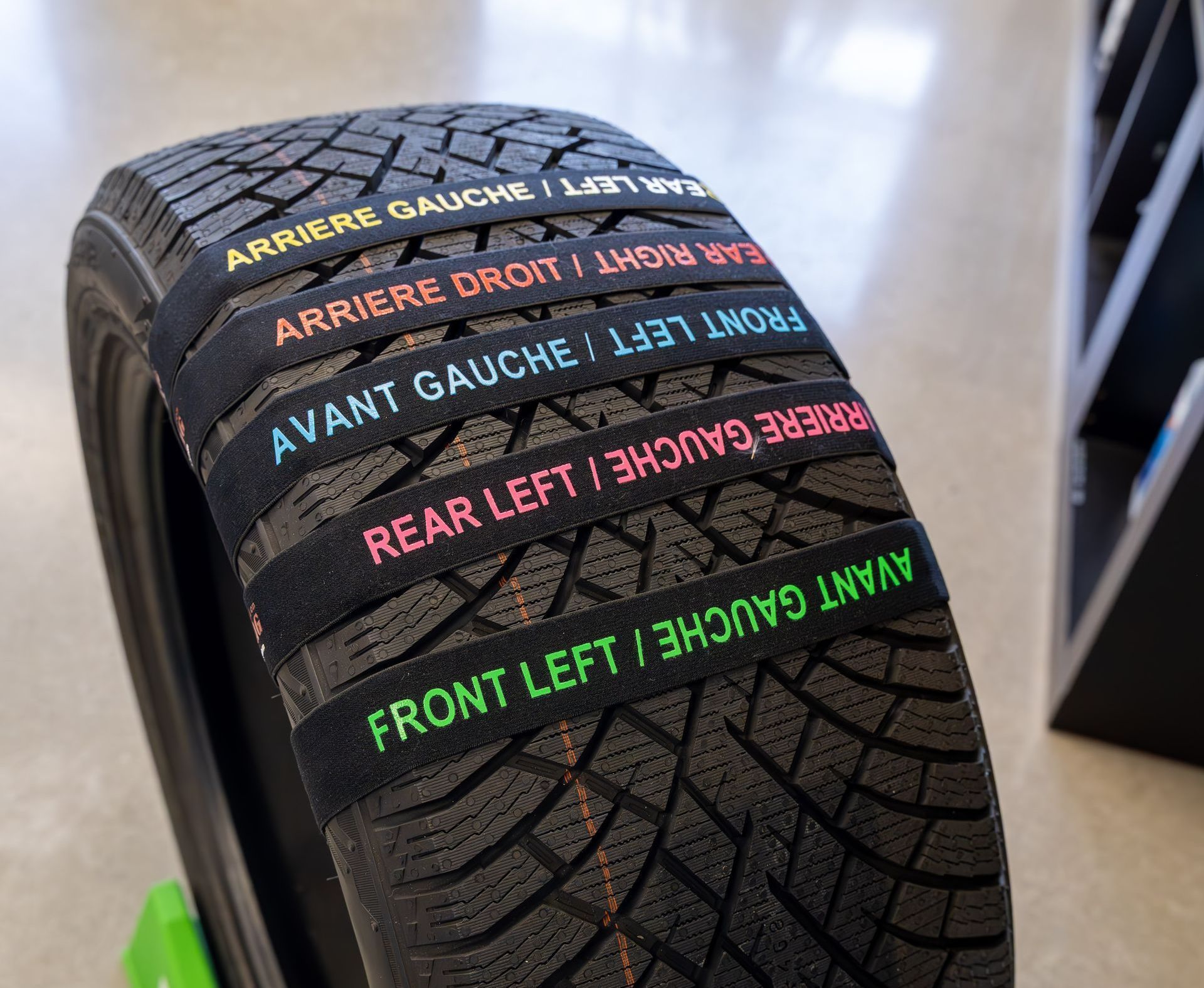 A close up of a tire that says ' avant gauche ' on it