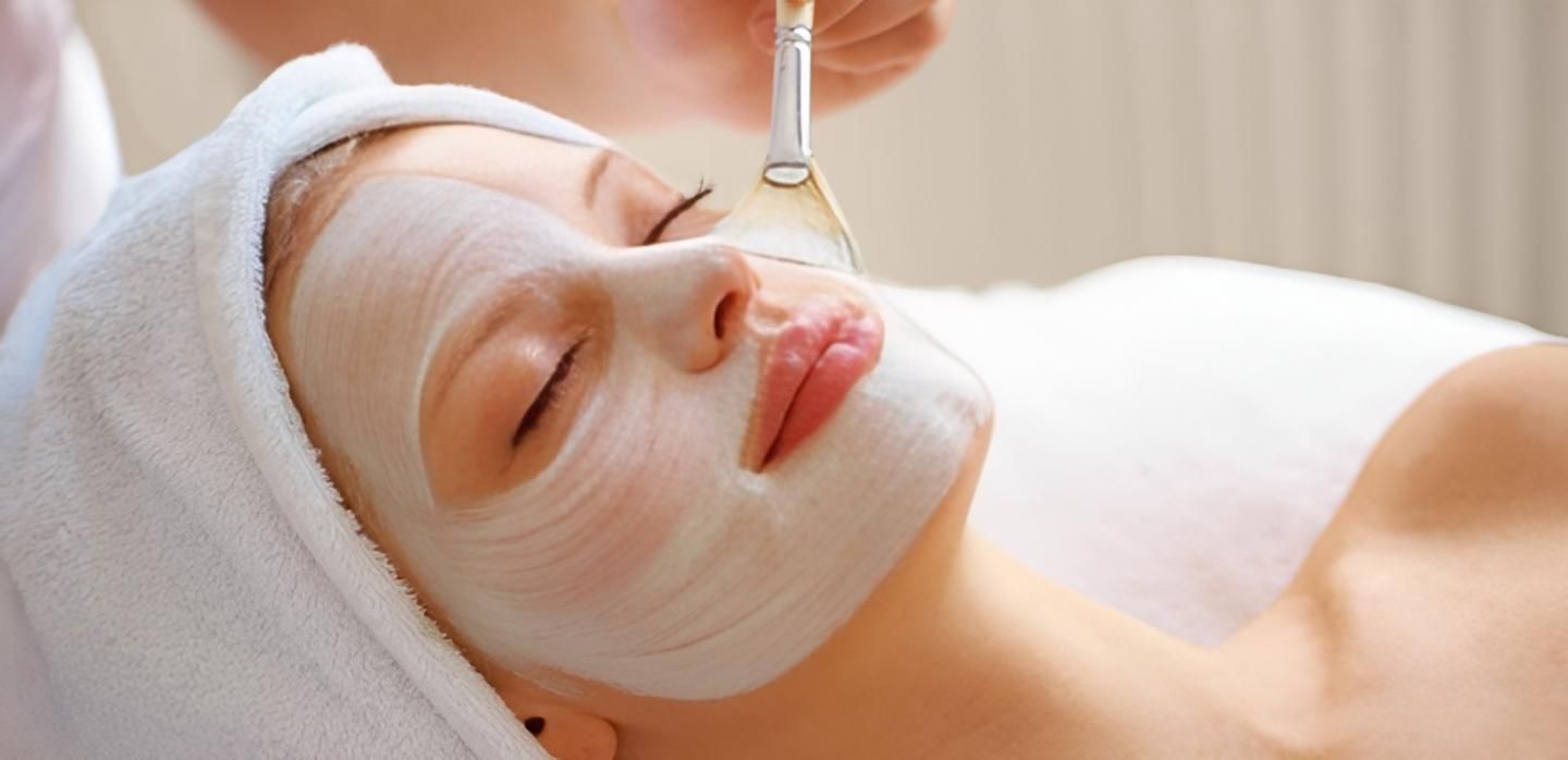 Client receiving a facial treatment at a Mackay skin clinic