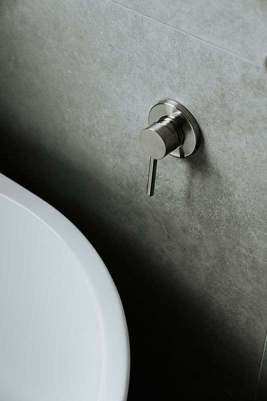 A Close up Of a Toilet and Sink in A Bathroom — Imperial Build Co. in Coombs, ACT