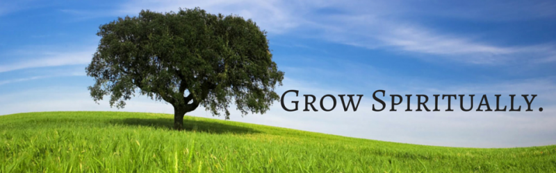 Tree in a green field under a blue sky with the words “Grow Spiritually.”