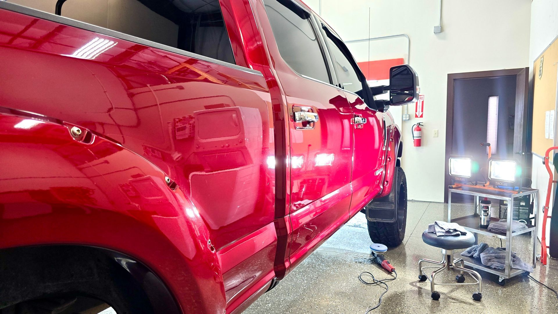 paint correction service on red pickup truck in Wichita, KS