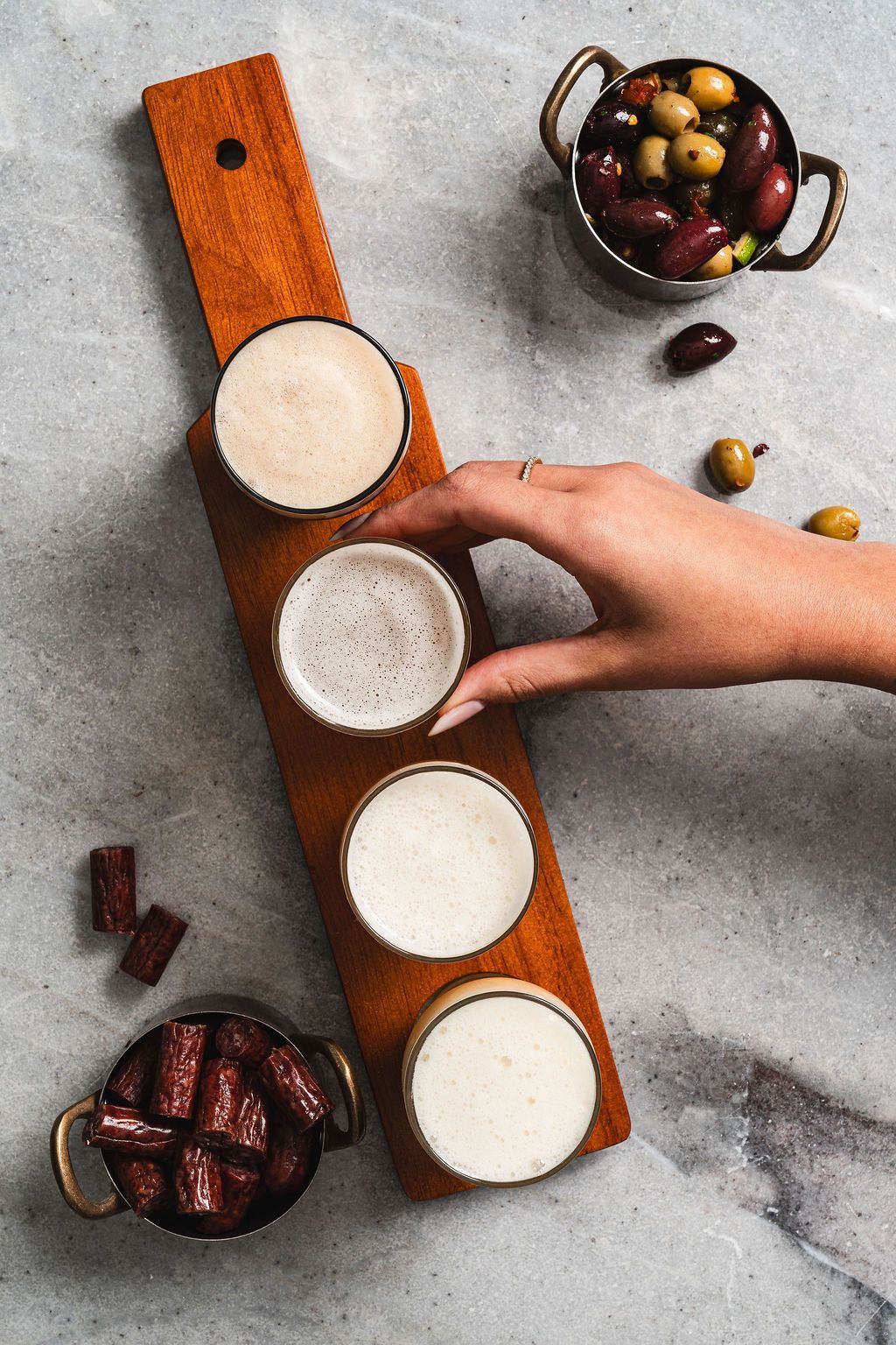 Beer flight and marinated olives.