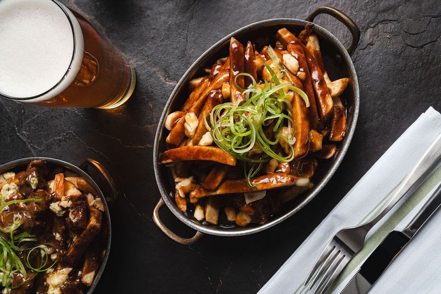 Poutine and a pint of beer.