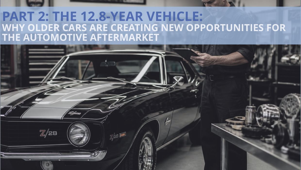 Mechanic inspecting a black camaro in a service bay with text overlay about the 12.8-year vehicle market