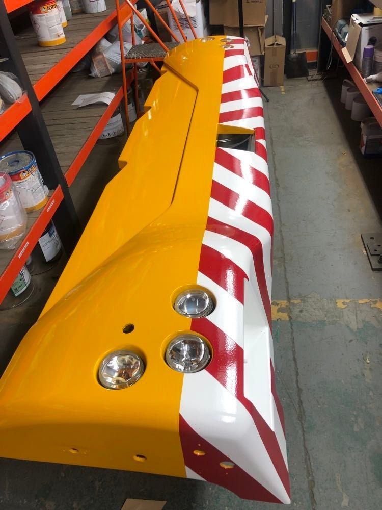 Spraying crane bumper
