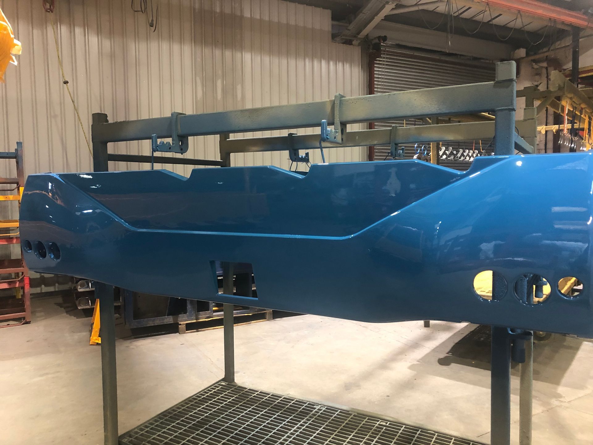 Spraying the crane bumper