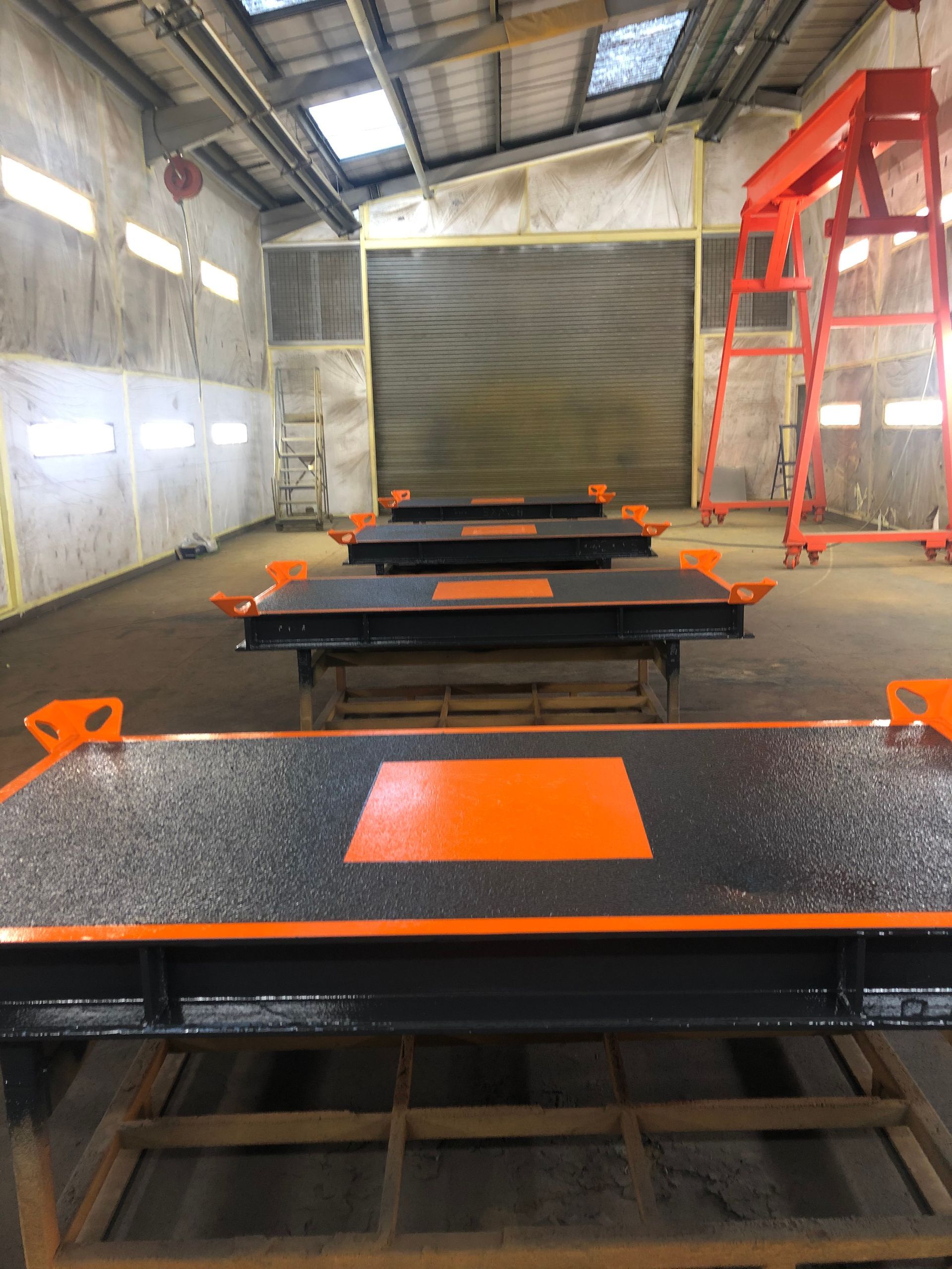 Spraying the crane mats