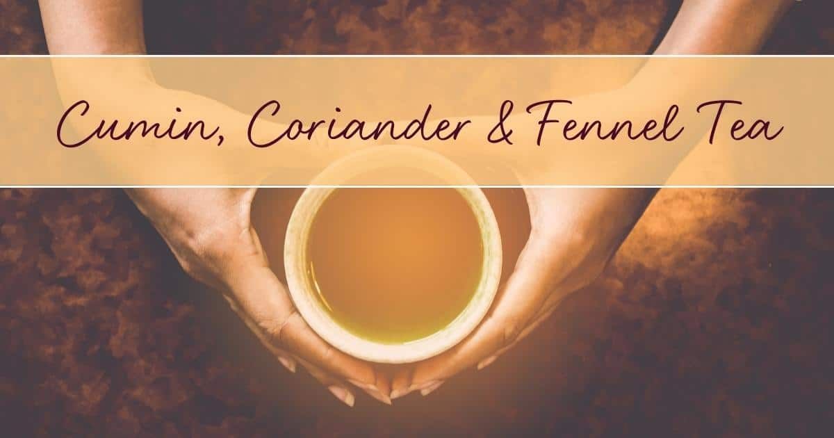 Hands holding a white teacup filled with golden liquid; text reads