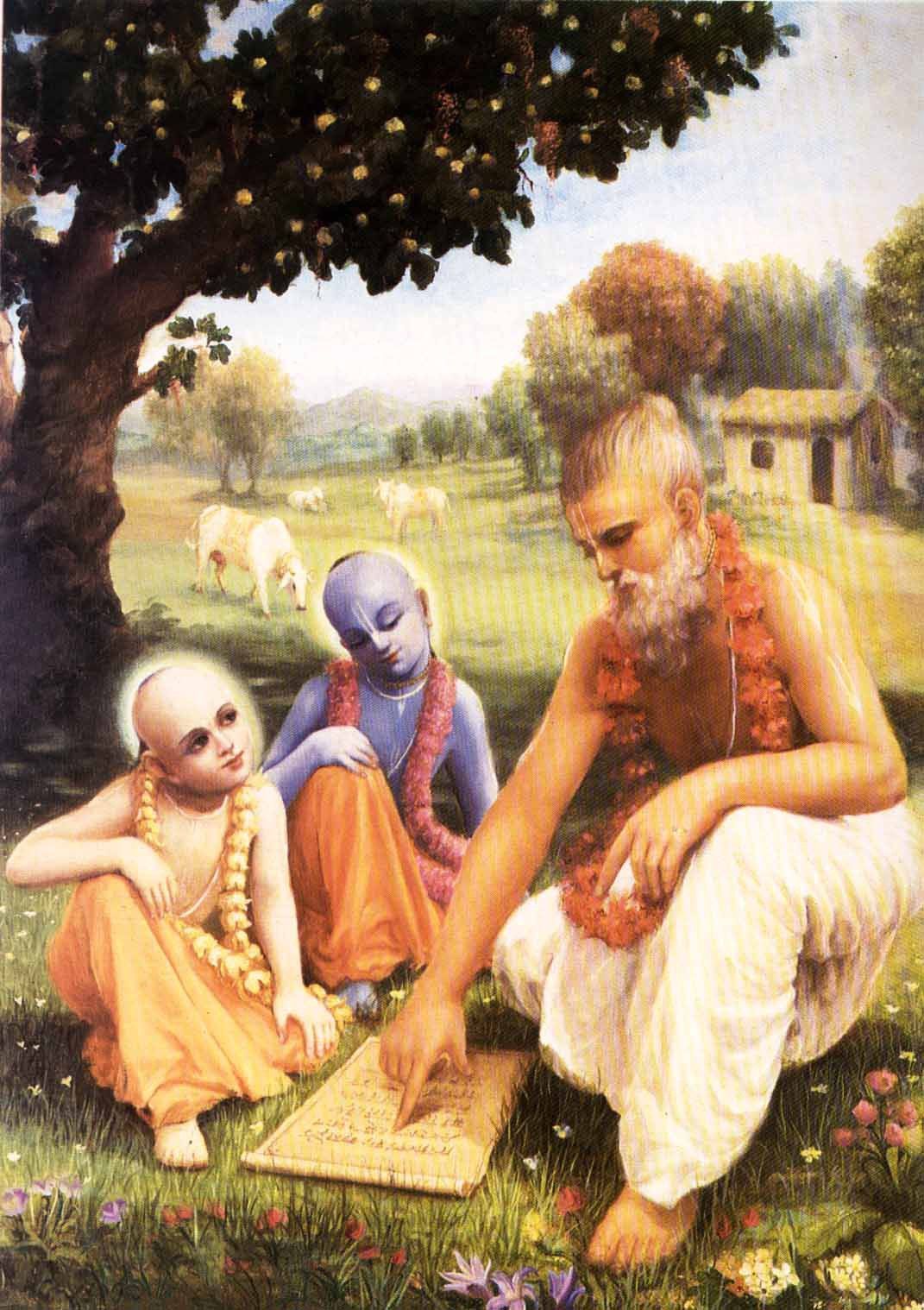 Teacher points to a script, explaining it to two students in a field.