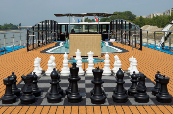 Sun deck with pool and large Chess set