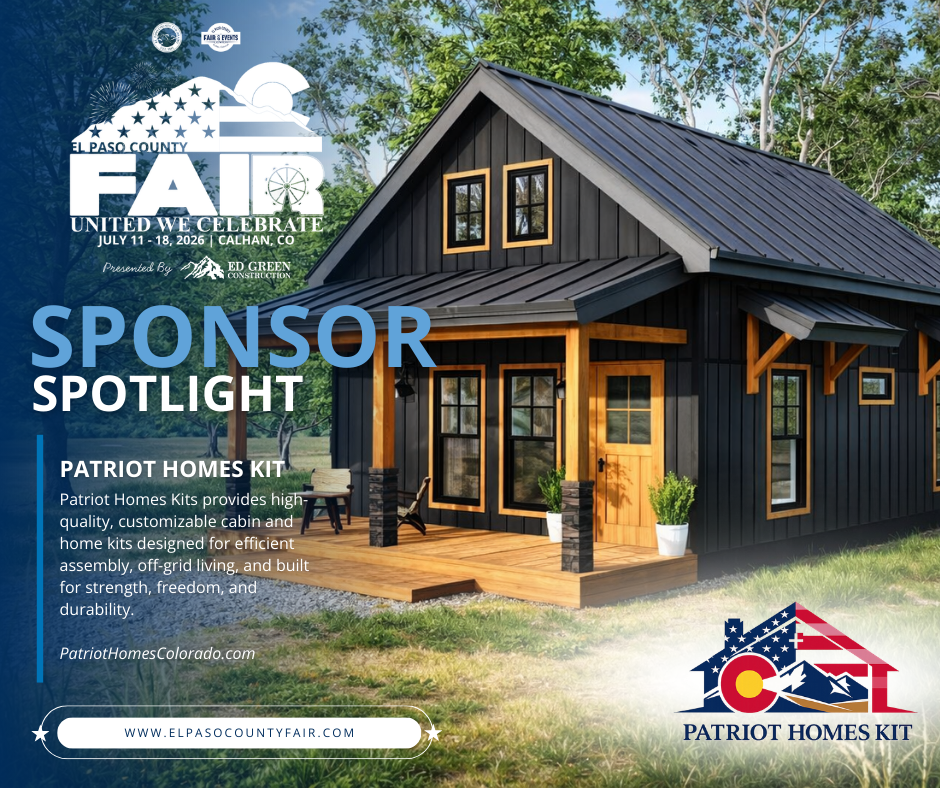 A wooden house with a pond in front of it