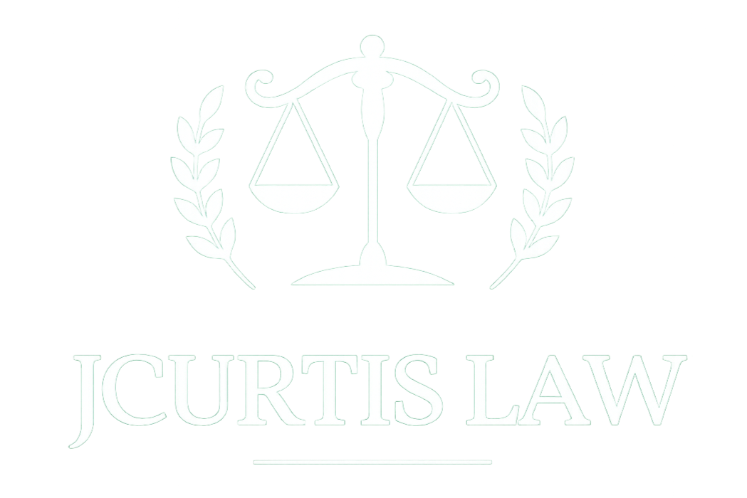 A white logo featuring the Scales of Justice icon above the text 