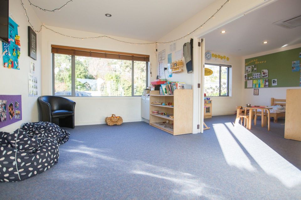 Bright preschool classroom with learning area