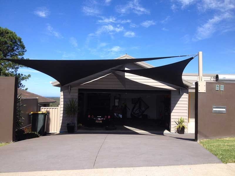 A House with A Black Shade Over the Garage Door — Jon Wilson Canvas & Shade in Coffs Harbour, NSW