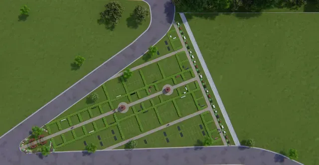 Aerial view of a triangular green park with paths, small trees, and adjacent roads on two sides