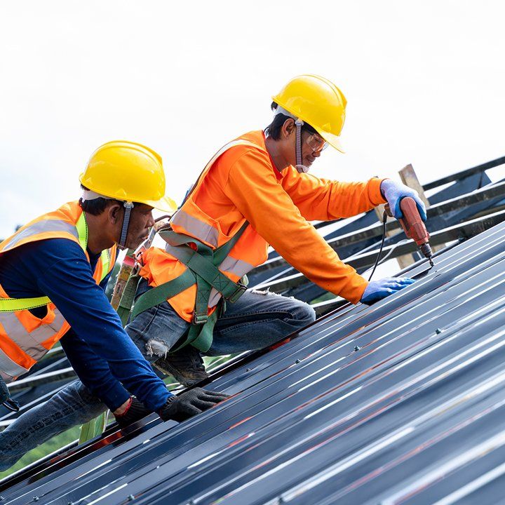 Workers Fixing Roof — Spokane Valley, WA — Garcia Roofing Workers Fixing Roof — Spokane Valley, WA — Garcia Roofing