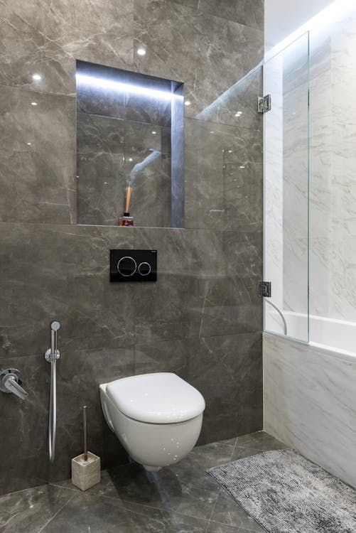 A Bathroom With a Toilet, Shower and Bathtub — Andergrove Plumbing & Drainage Pty Ltd In Richmond, QLD